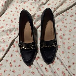 BCBGeneration Women's Black Flats with Gold Accent